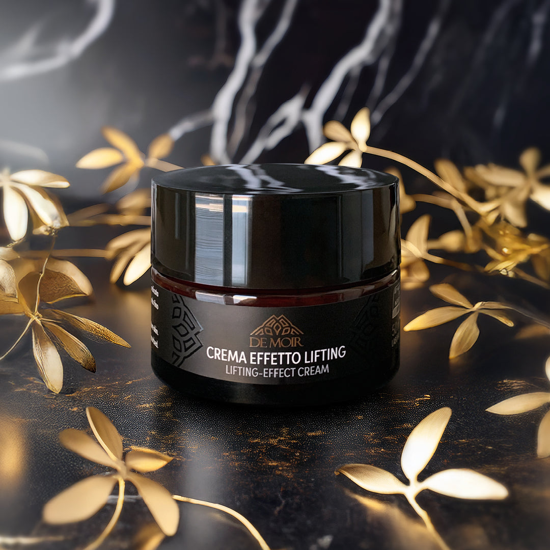 immagine della crema effetto lifting su sfondo nero con venature dorate e fiori dorati